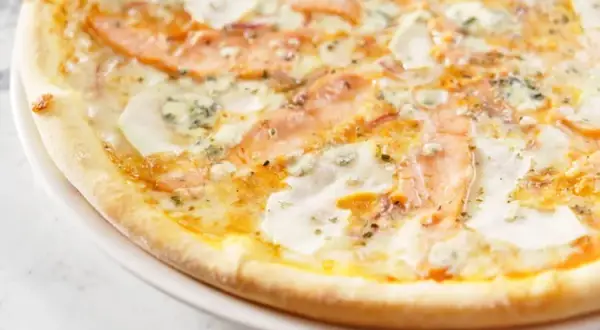 Pizza saumon : la recette crémeuse et ses secrets pour réussir