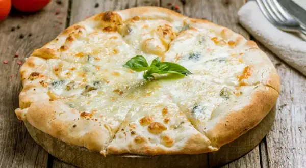 Réussir sa pizza blanche : bases, garnitures et secrets de pro